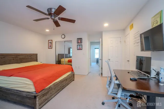 a bedroom with a bed and furniture