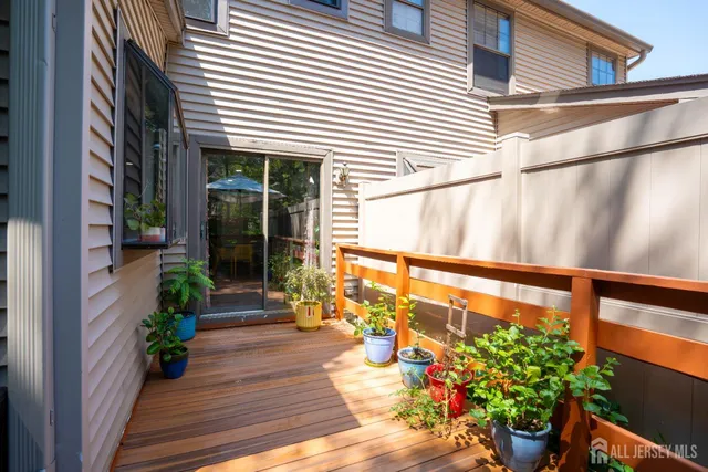 a view of a balcony with chairs