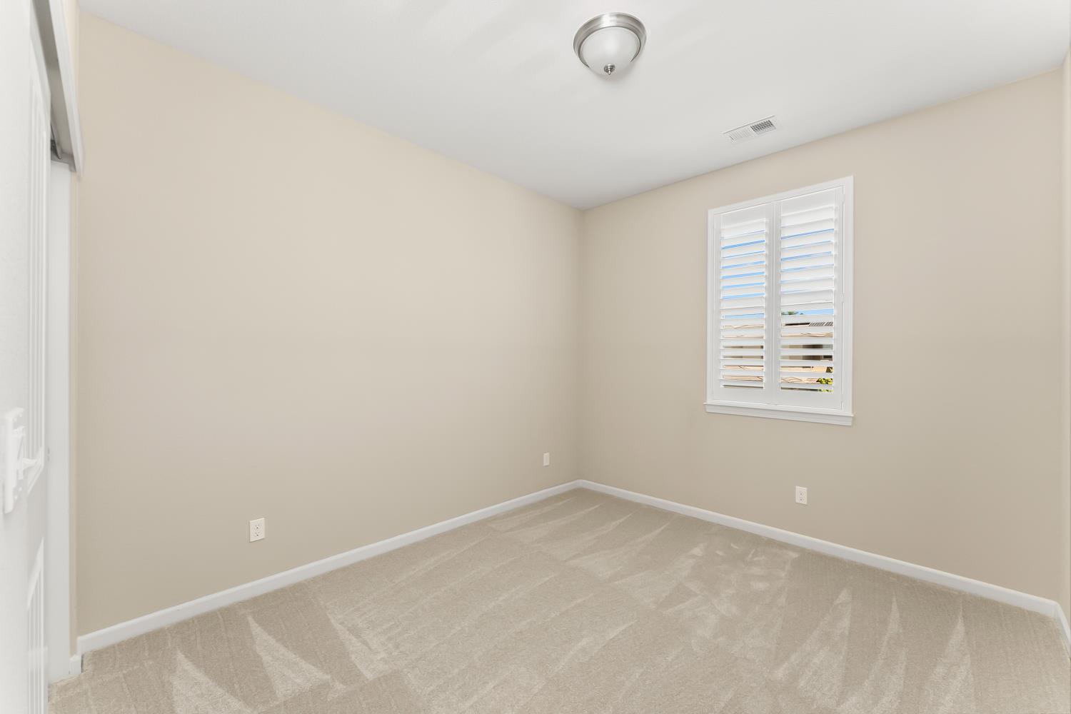 5453 Mossy Stone Way Rancho Cordova, CA 95742 - Photo 47 of 81 an empty room with a window