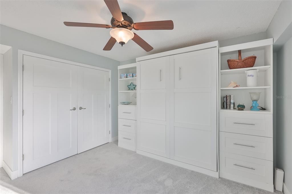 14800 Walsingham Road, Unit 1203 Largo, FL 33774 - Photo 24 of 68 a view of a livingroom with closet