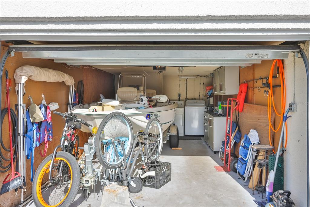 14800 Walsingham Road, Unit 1203 Largo, FL 33774 - Photo 31 of 68 a utility room with two washing machine