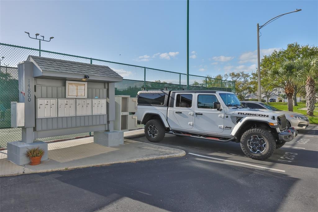 14800 Walsingham Road, Unit 1203 Largo, FL 33774 - Photo 41 of 68 a view of a car in garage