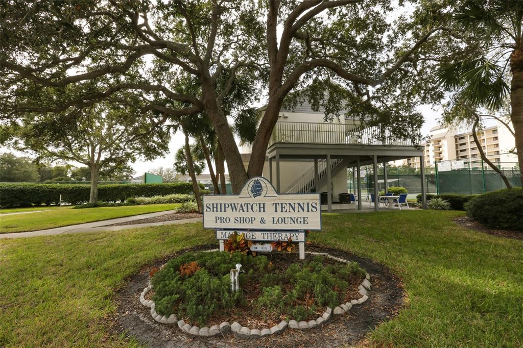 14800 Walsingham Road, Unit 1203 Largo, FL 33774 - Photo 43 of 68 a front view of a house with garden