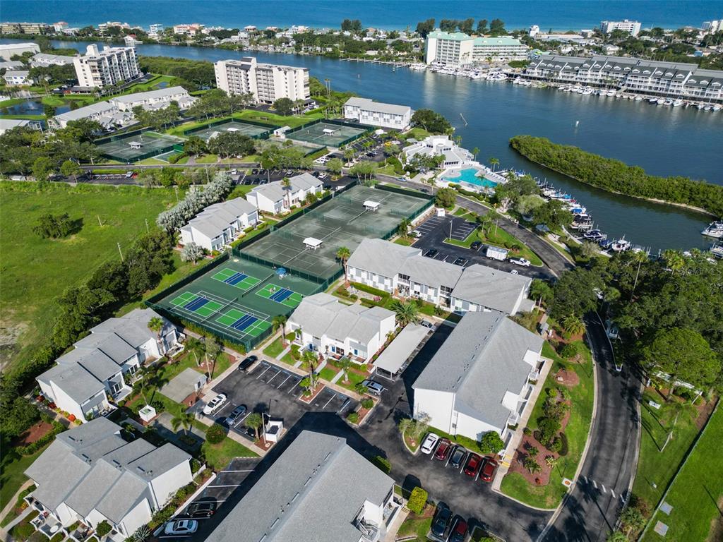 14800 Walsingham Road, Unit 1203 Largo, FL 33774 - Photo 47 of 68 an aerial view of a city with lake view