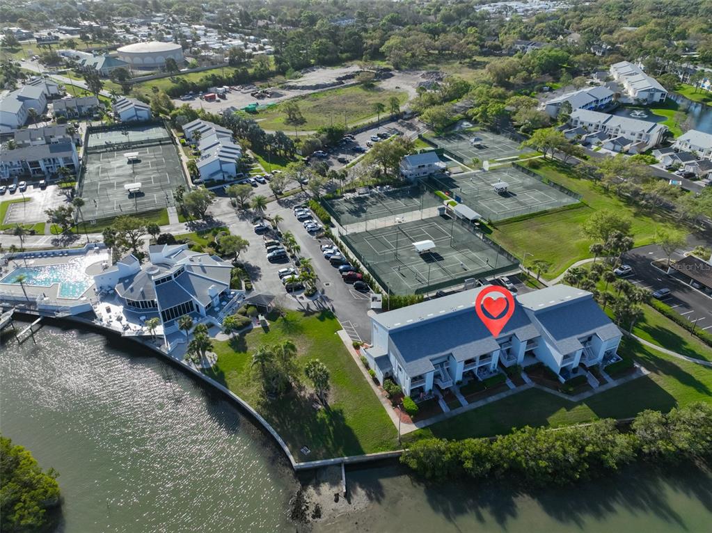 14800 Walsingham Road, Unit 1203 Largo, FL 33774 - Photo 66 of 68 an aerial view of residential houses with outdoor space