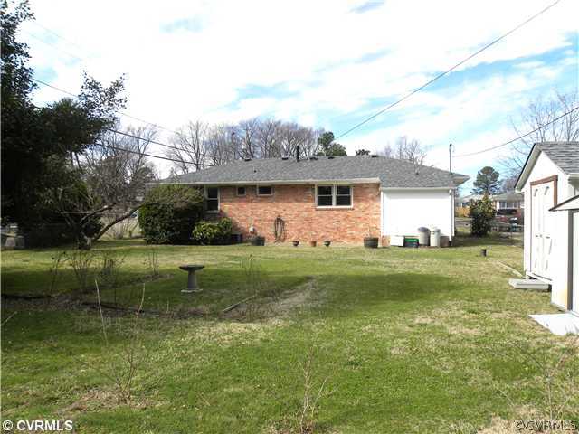Land/Lot - Deep, fenced yard with two sheds (one w