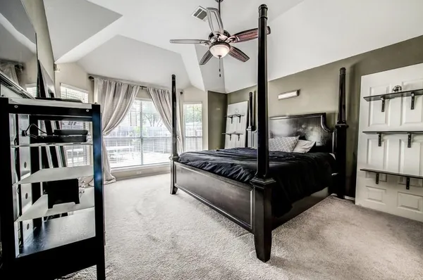 a bathroom with double sink and a mirror