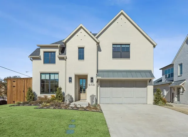 a view of house with yard