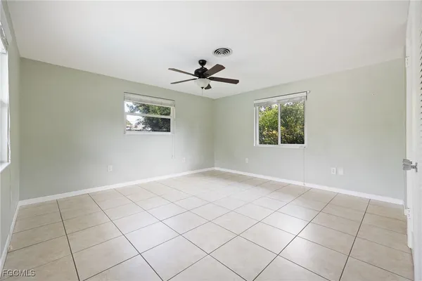 a view of an empty room and window
