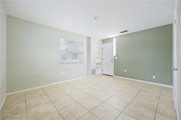 a bathroom with a sink a toilet a mirror and shower