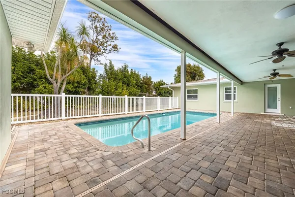 a view of a house with swimming pool