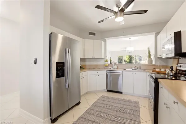 $288,000 | 7819 Regal Heron Circle, Unit 201, Naples, FL 34104