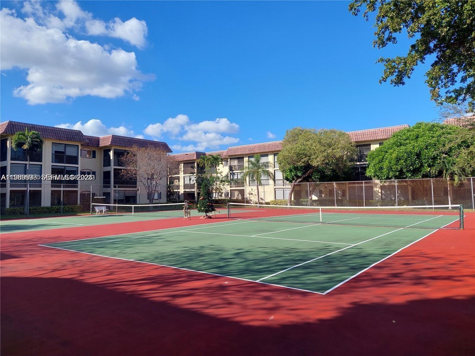 253 South Cypress Road, Unit 214 Pompano Beach, FL 33060 - Photo 20 of 25 a view of a volley ball court
