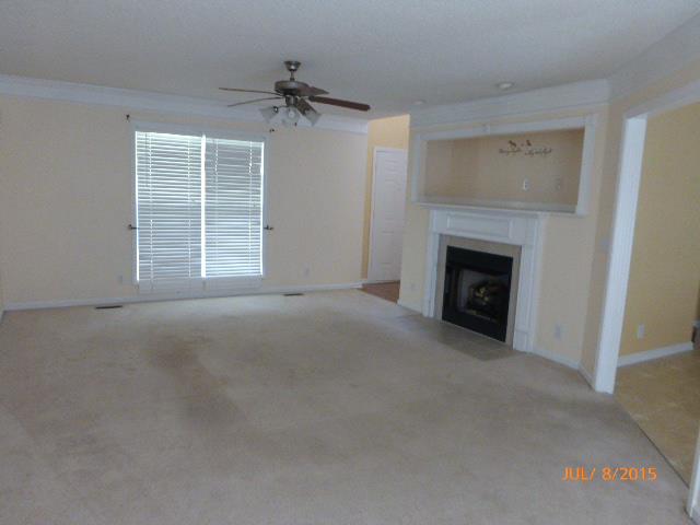 1601 Windriver Road Clarksville, TN 37040 - Photo 2 of 18 Wishing you had more living room space? Now you can! Large windows, a separate seating area and a gas log fireplace make this an inviting space. A conveniently built in media console is an added feature above the stylish mantle.