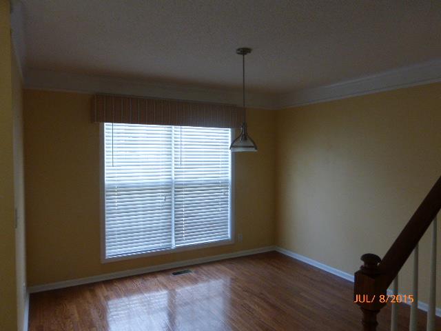 1601 Windriver Road Clarksville, TN 37040 - Photo 4 of 18 Prepare to wow your guests while entertaining in the dining room. Located adjacent to the kitchen, it features hardwood flooring and 2 large floor to ceiling picture windows that light up the room! Wide crown molding adds a formal look!