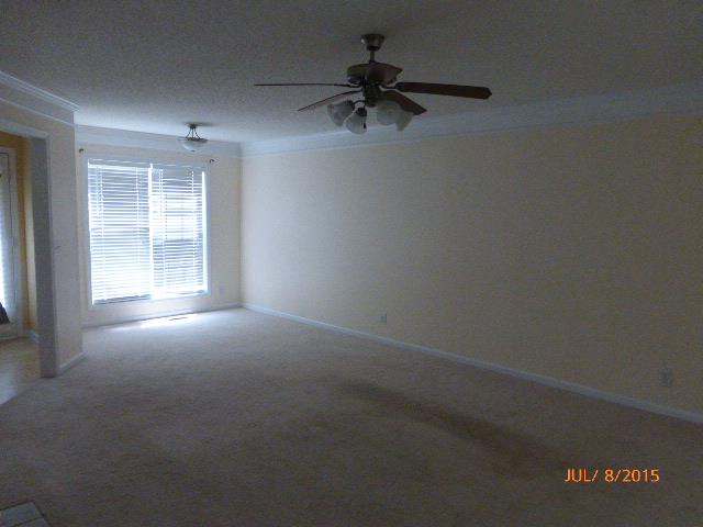 1601 Windriver Road Clarksville, TN 37040 - Photo 5 of 18 This is the secondary angle of the living room which shows the cozy sitting area with huge windows and its own light fixture- great space for an office, reading nook or play area-you decide!