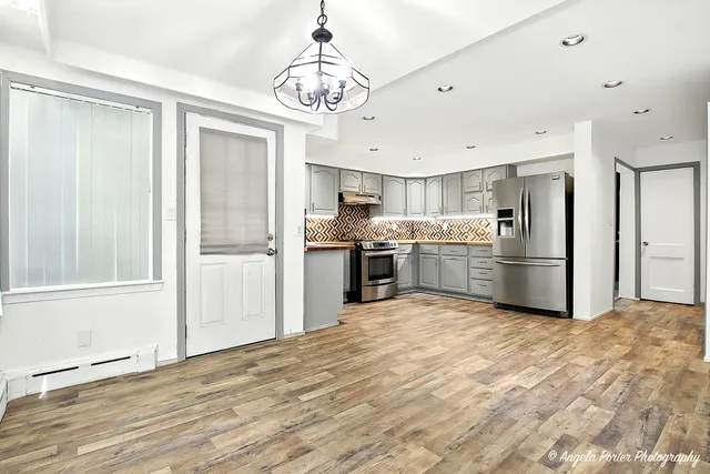 a bathroom with a sink and a bathtub