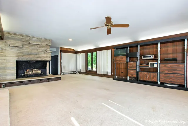 a view of a livingroom with wooden floor