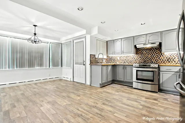 a view of a room with a large window