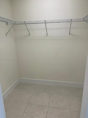 a bathroom with a bathtub and a sink