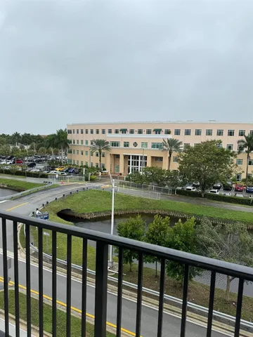 a view of a balcony with an ocean view