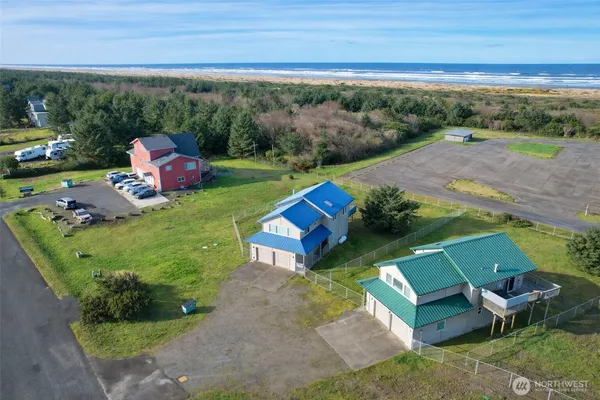 a view of a two chairs in the garden