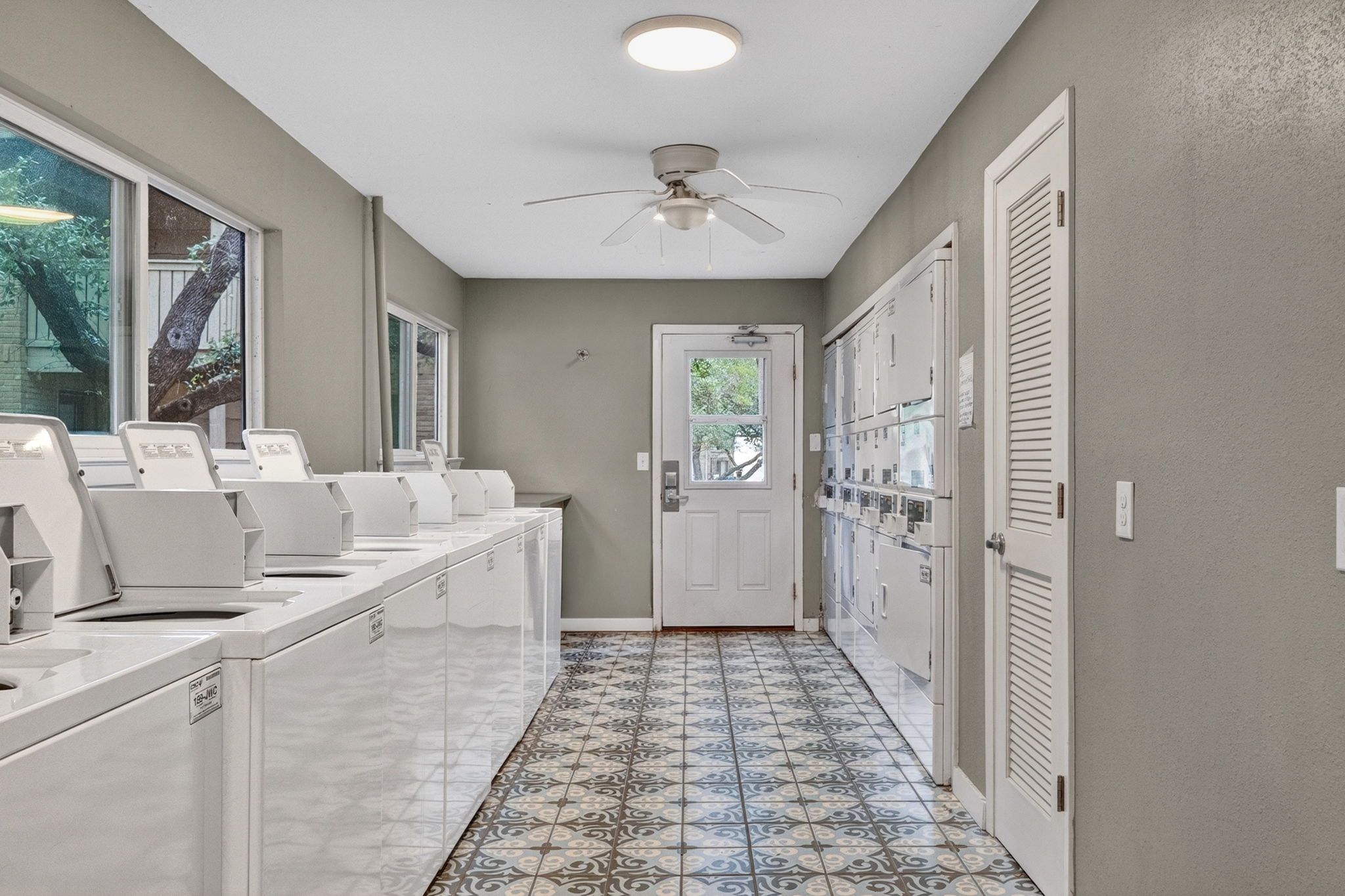 8210 Bent Tree Road, Unit 256 Austin, TX 78759 - Photo 23 of 29 a bathroom with a sink a mirror and a shower