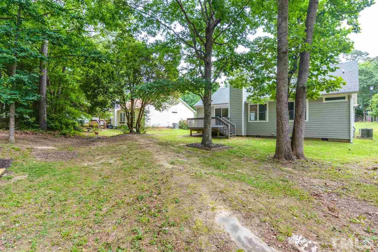 3628 Epperly Court Raleigh, NC 27616 - Photo 18 of 18 a view of a yard with tree s