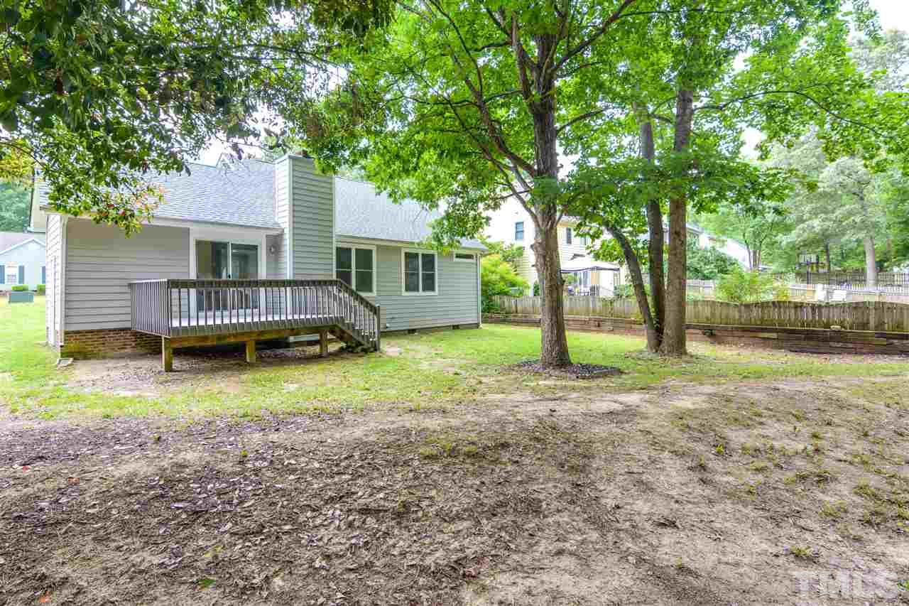 3628 Epperly Court Raleigh, NC 27616 - Photo 5 of 18 a view of a house with backyard and trees