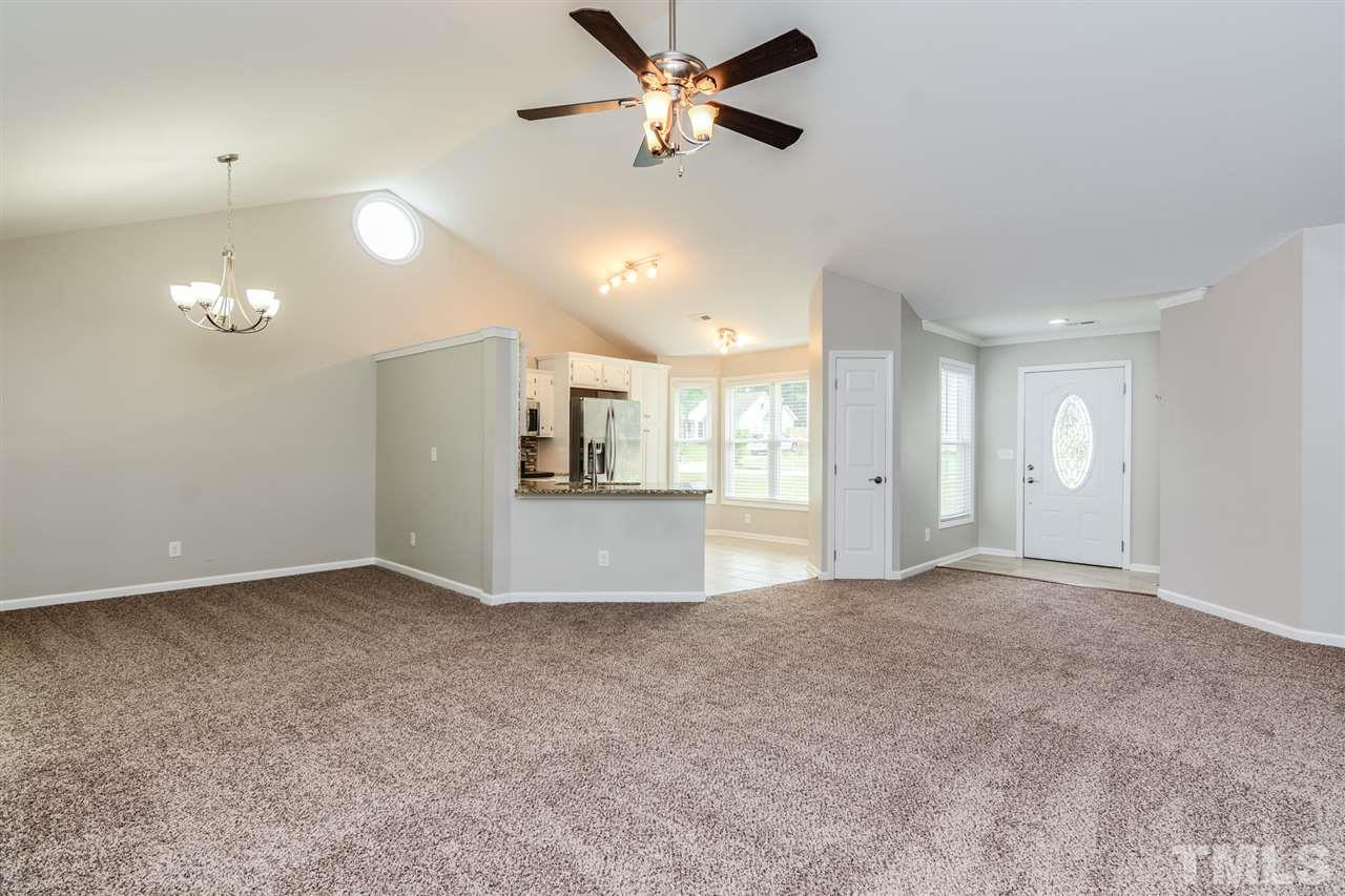 3628 Epperly Court Raleigh, NC 27616 - Photo 9 of 18 a view of a kitchen with a sink and a refrigerator
