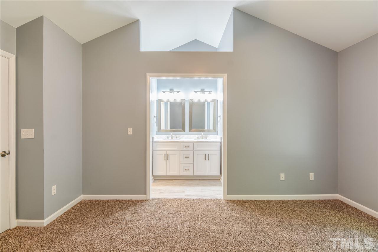 3628 Epperly Court Raleigh, NC 27616 - Photo 10 of 18 an empty room with windows and closet