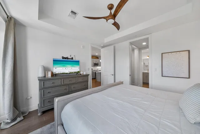 a bathroom with a shower sink and mirror