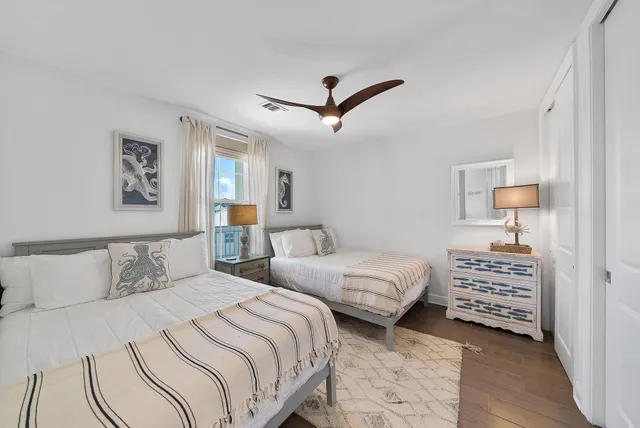 a bedroom with a bed and a table