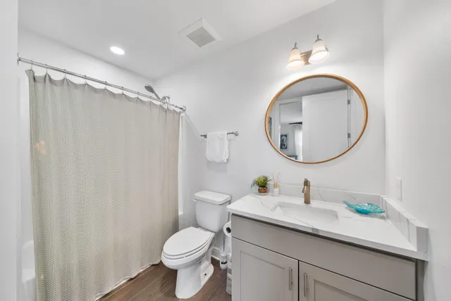 a view of bedroom with window