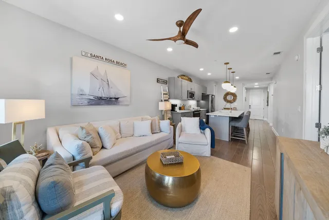 a kitchen that has a sink a stove and cabinets