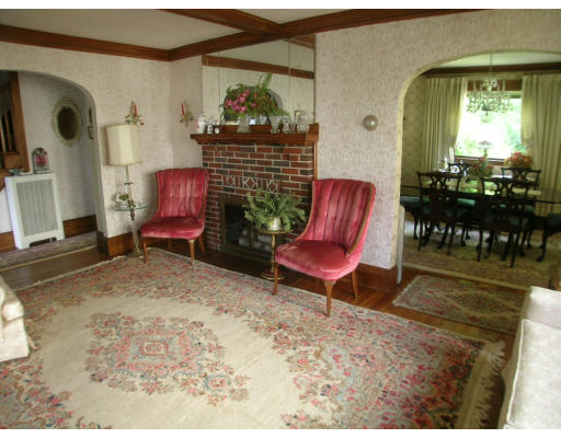 12 Benjamin Road Arlington, MA 02476 - Photo 4 of 11 a living room with furniture and a potted plant