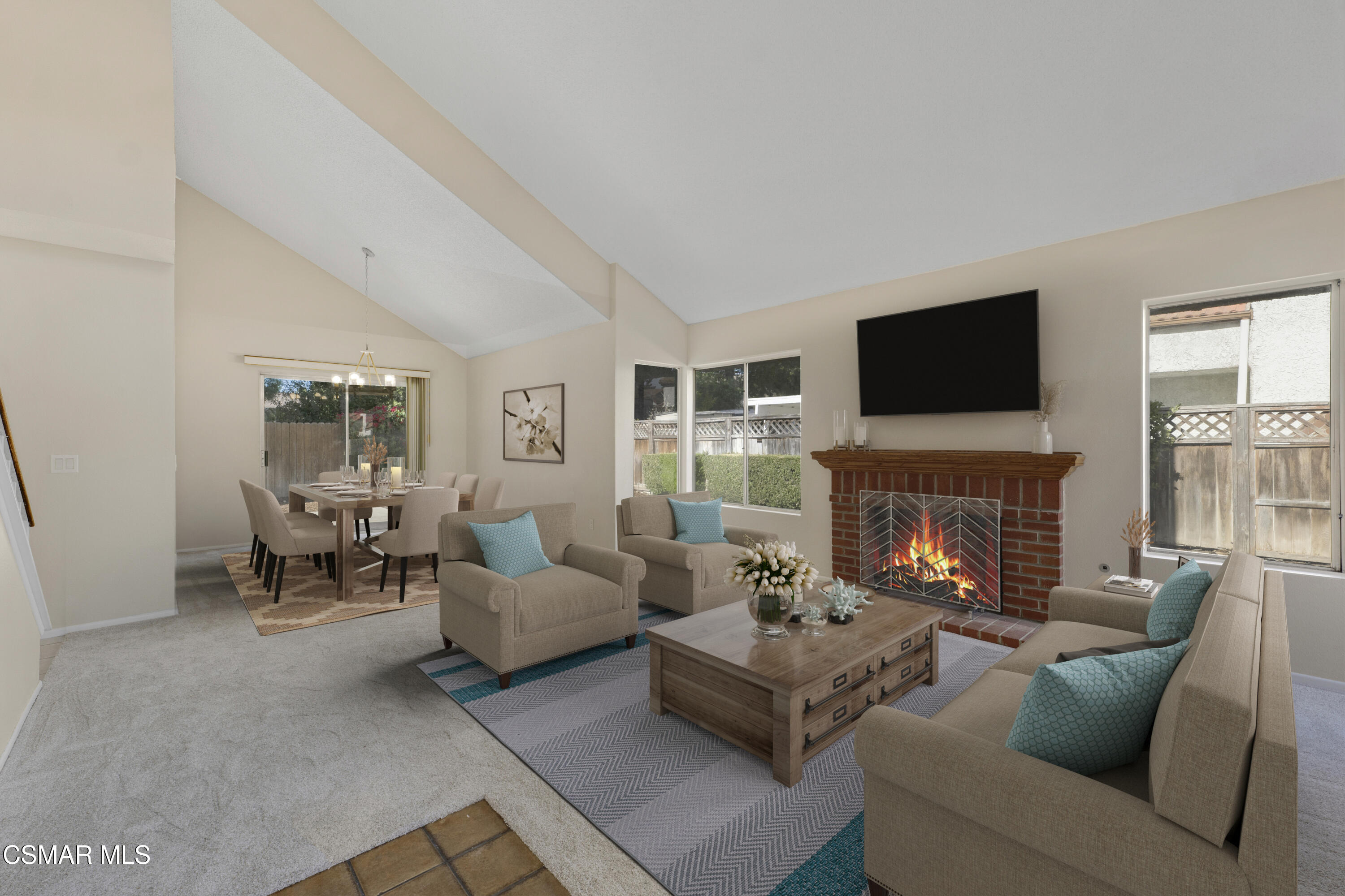 6635 Pecan Avenue Moorpark, CA 93021 - Photo 4 of 54 a living room with furniture a fireplace and a flat screen tv