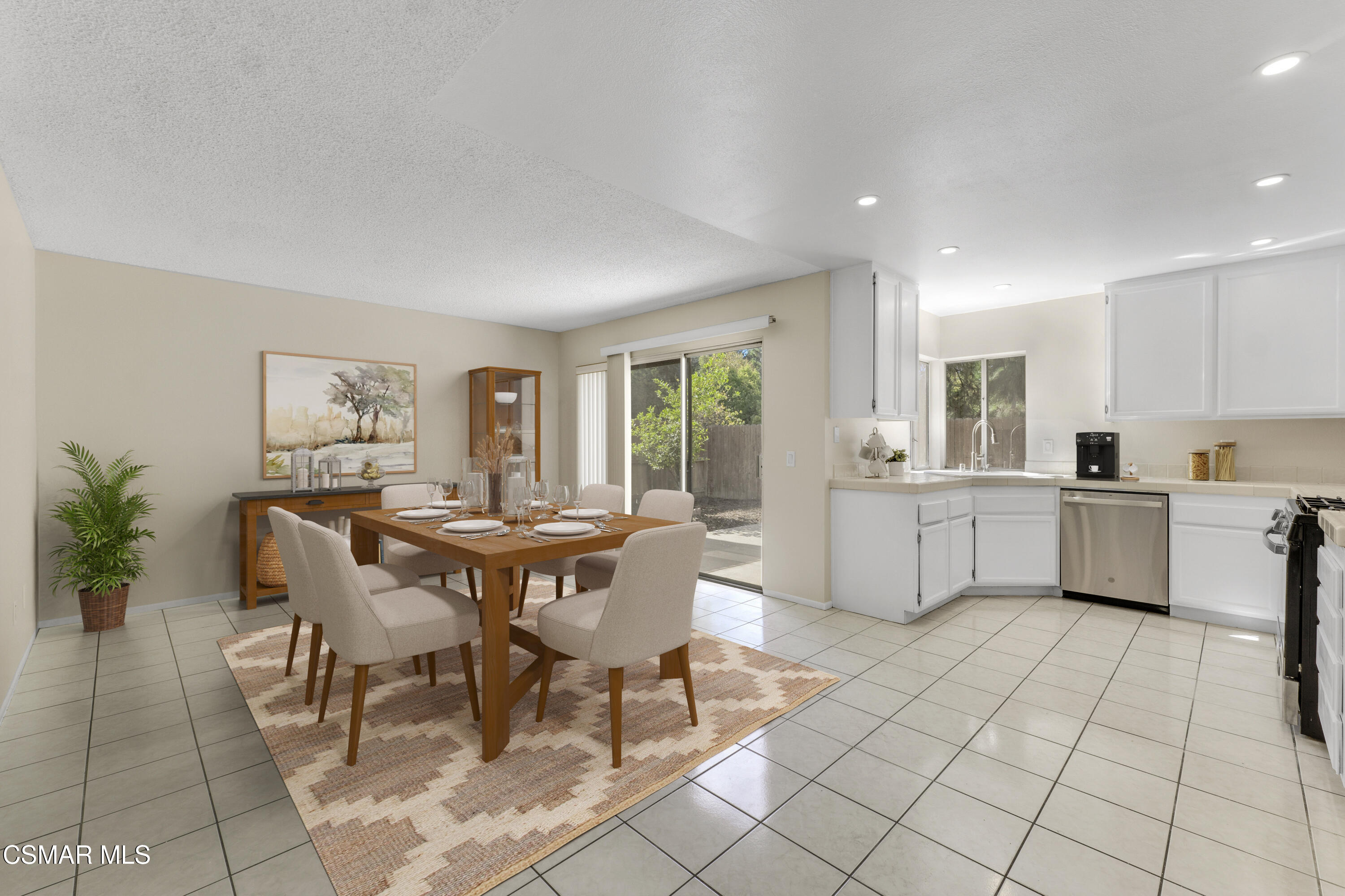 6635 Pecan Avenue Moorpark, CA 93021 - Photo 9 of 54 a view of a dining room with furniture and chandelier