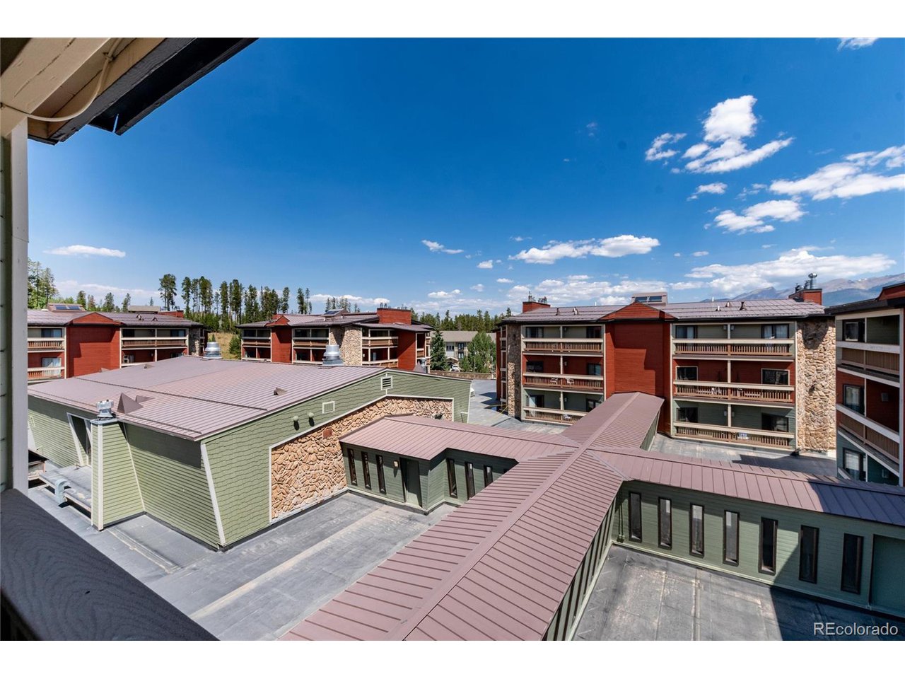 490 Kings Crossing Road, Unit 631 Winter Park, CO 80482 - Photo 33 of 43 a view of a roof deck with couches chairs and potted plants
