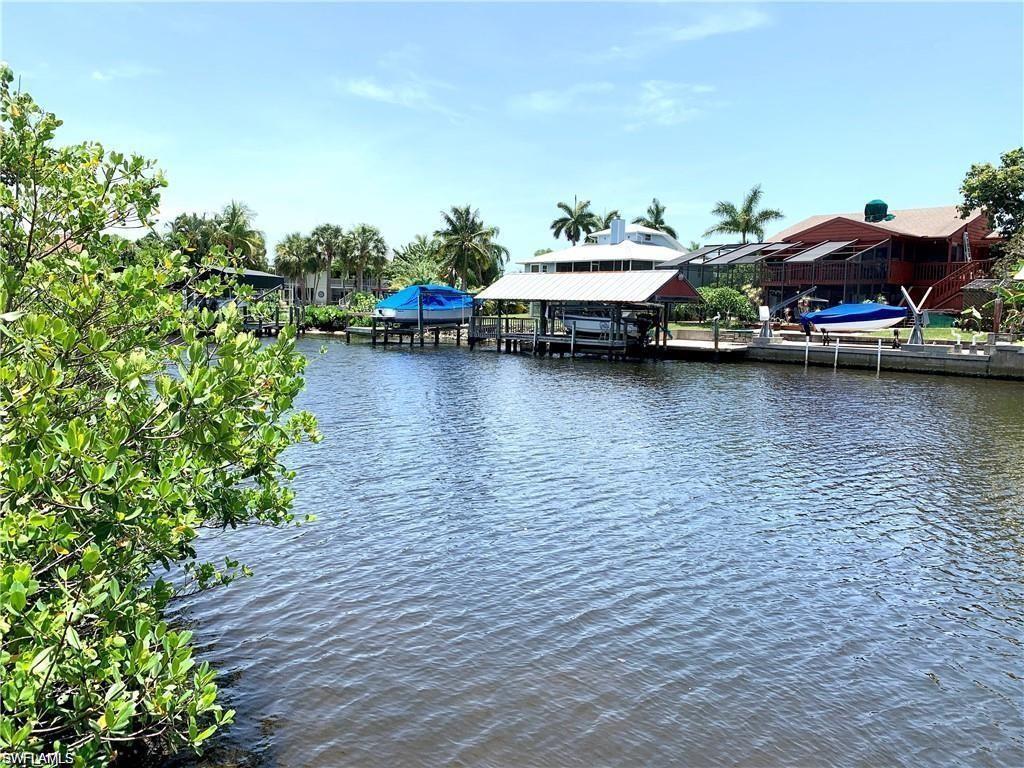an ocean view with residential house and outdoor space