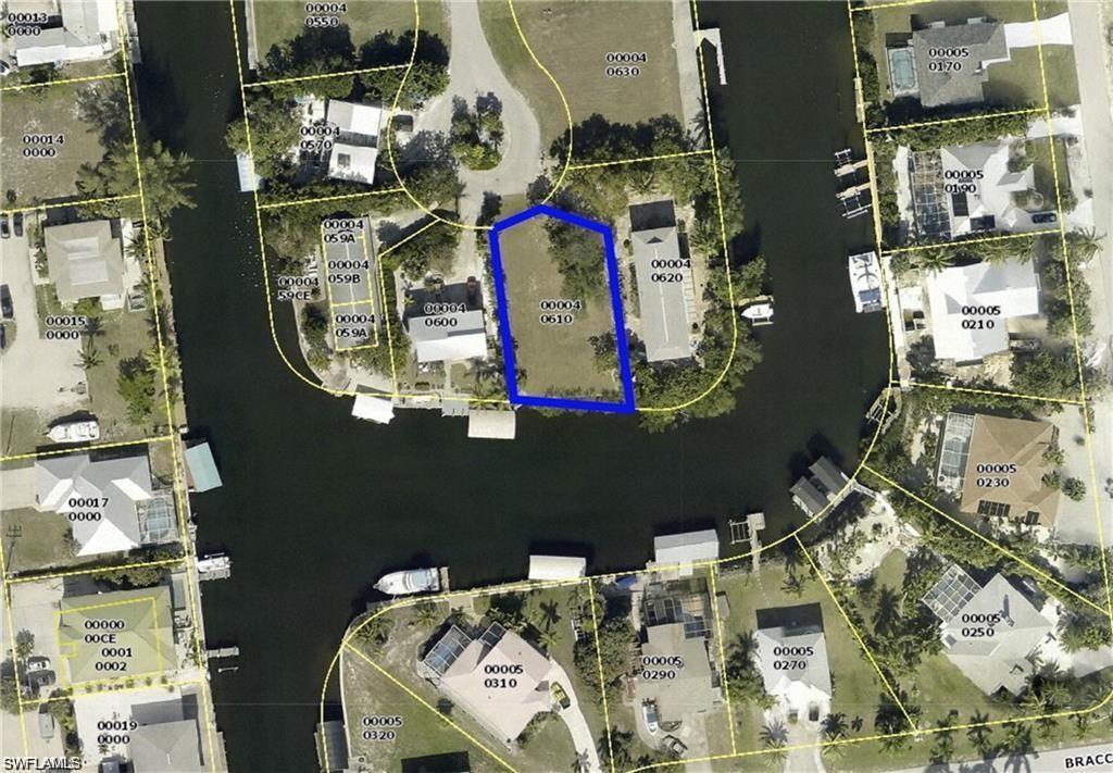 3200 Stabile Road St. James City, FL 33956 - Photo 3 of 7 an aerial view of waterside residential houses