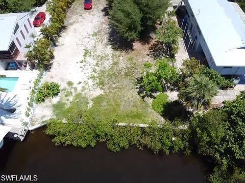 3200 Stabile Road St. James City, FL 33956 - Photo 6 of 7 an aerial view of a house with a yard