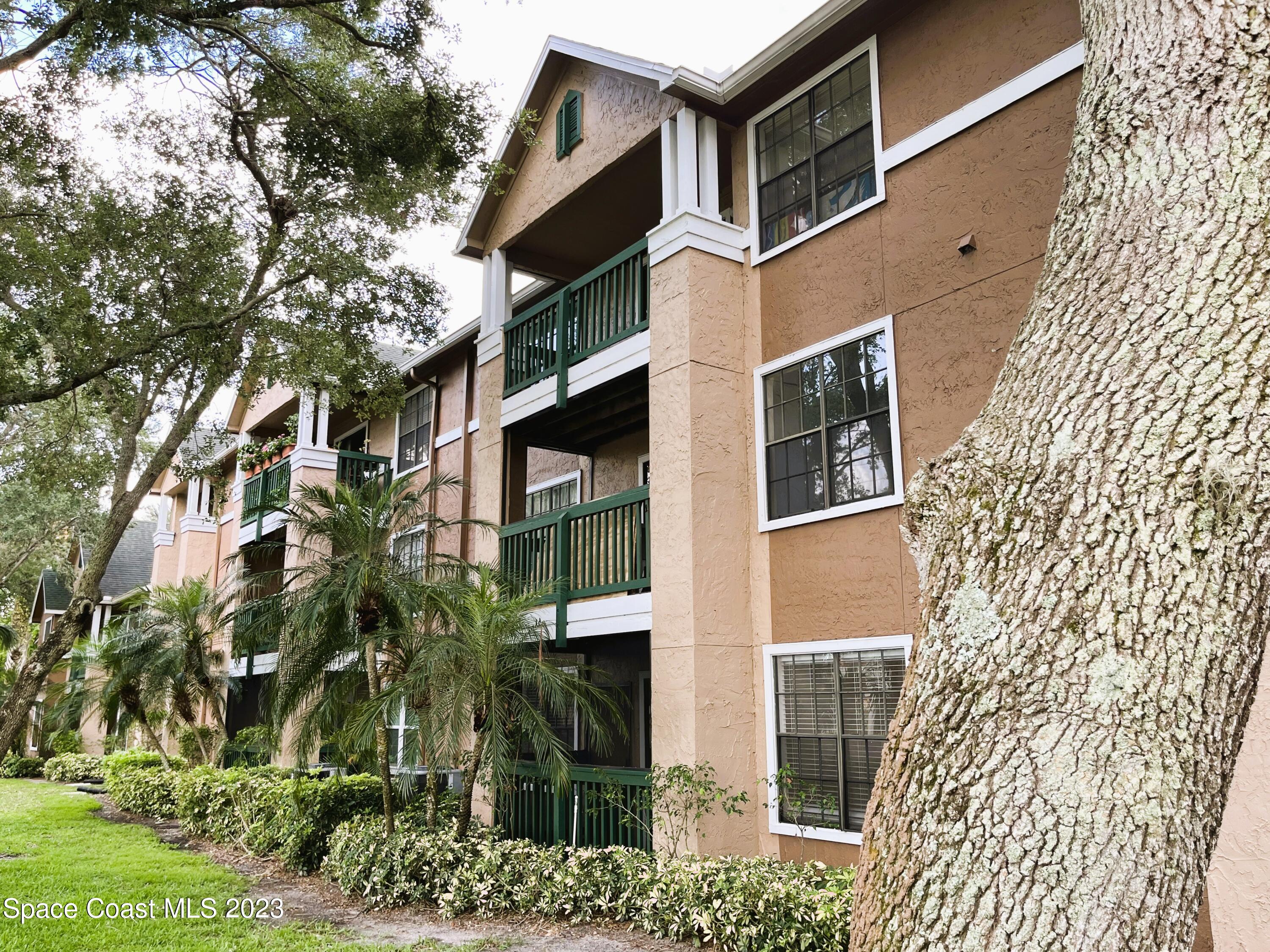 7667 North Wickham Road, Unit 304 Melbourne, FL 32940 - Photo 1 of 36 front view of a building