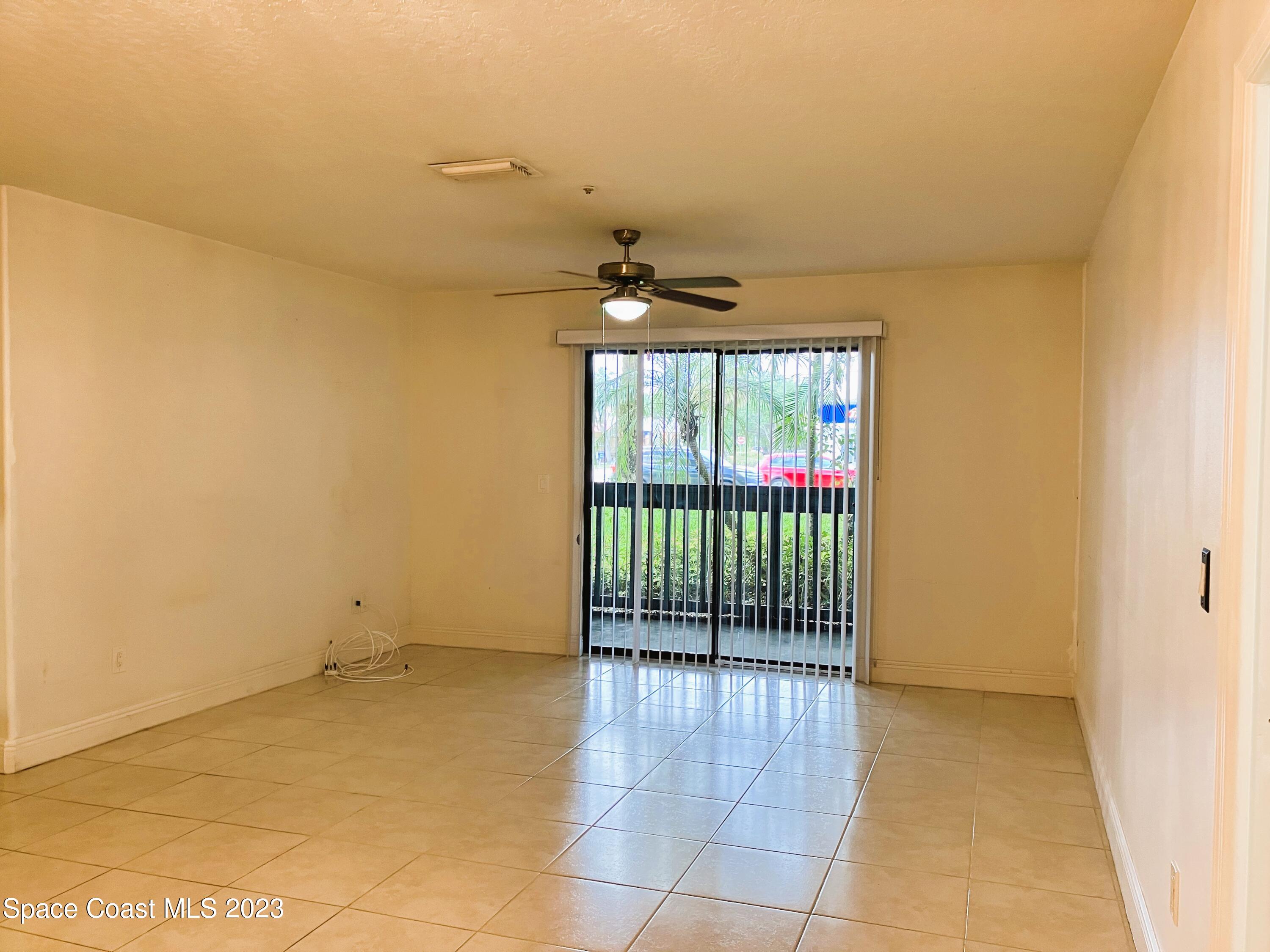7667 North Wickham Road, Unit 304 Melbourne, FL 32940 - Photo 23 of 36 a view of an empty room