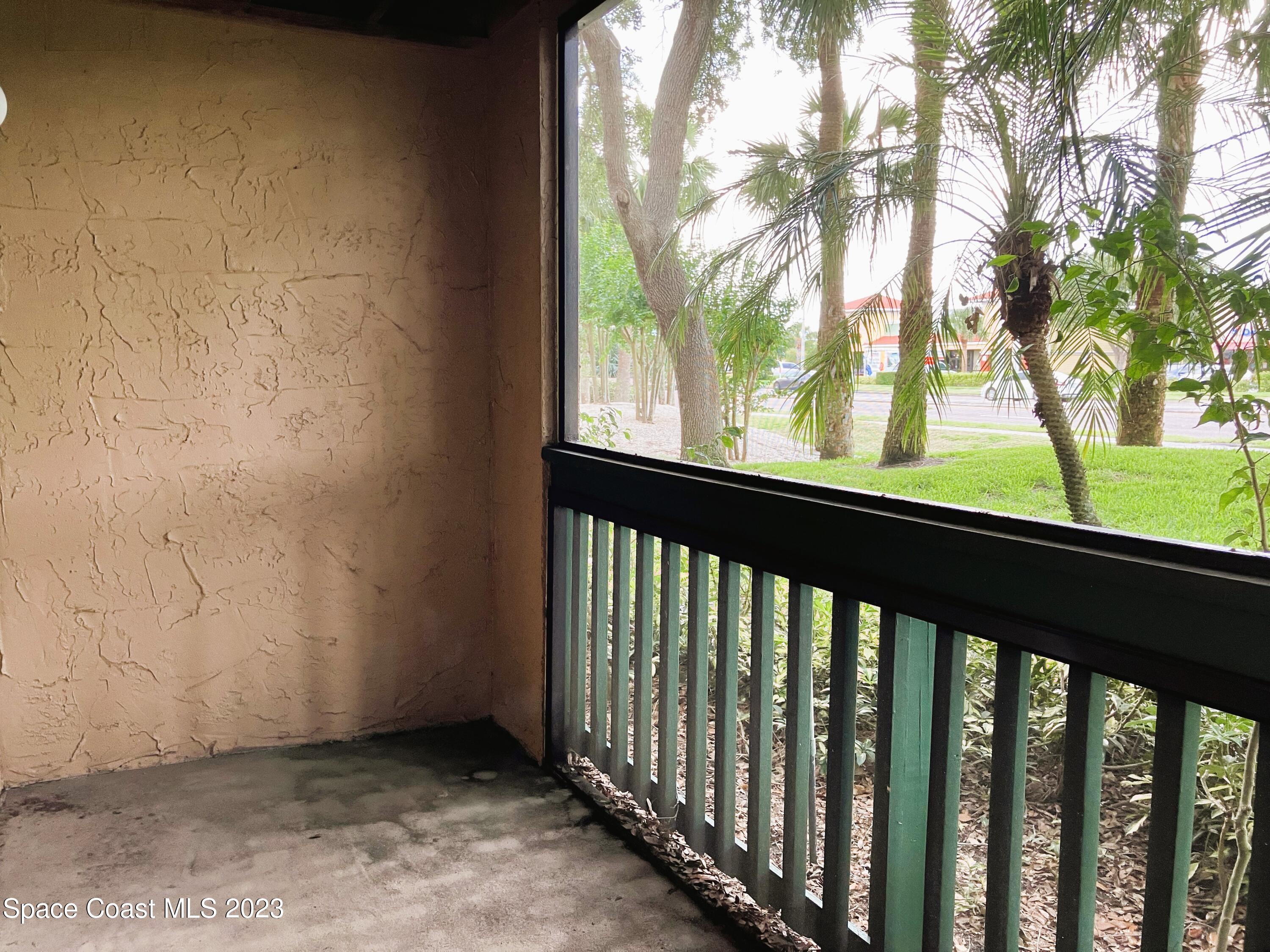 7667 North Wickham Road, Unit 304 Melbourne, FL 32940 - Photo 33 of 36 a view of a porch