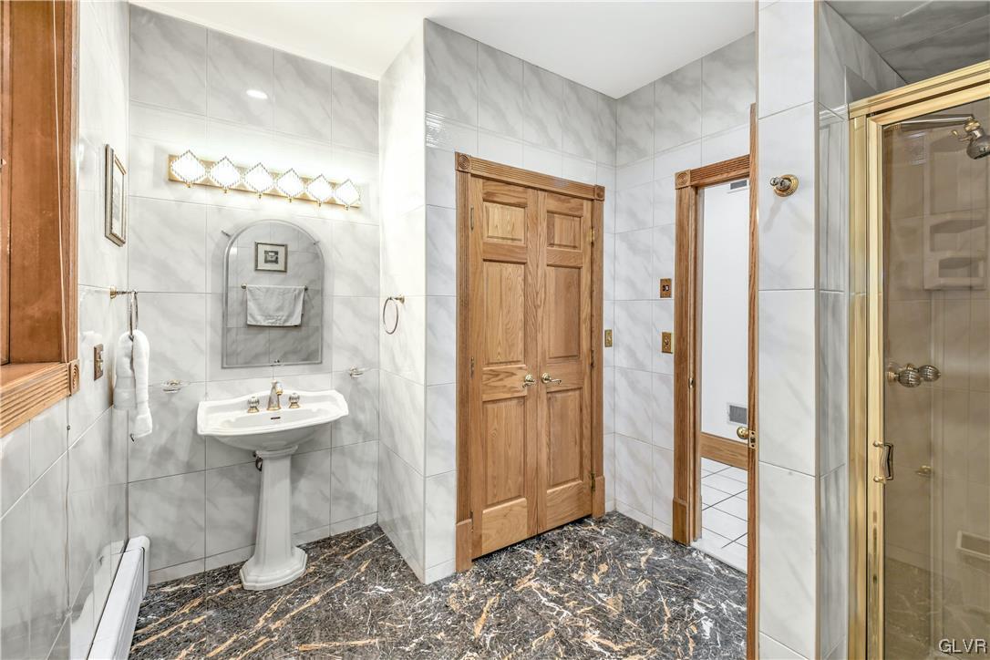 3166 Apollo Drive Bethlehem, PA 18017 - Photo 15 of 37 a bathroom with a sink a toilet and shower