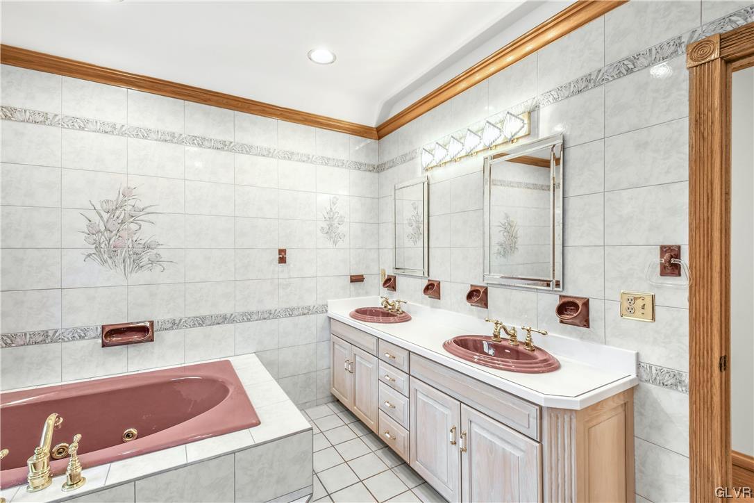 3166 Apollo Drive Bethlehem, PA 18017 - Photo 26 of 37 a bathroom with a sink a tub and a shower