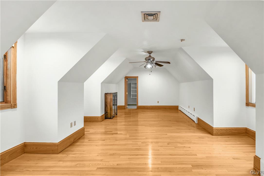 3166 Apollo Drive Bethlehem, PA 18017 - Photo 27 of 37 a view of an empty room with wooden floor and a ceiling fan