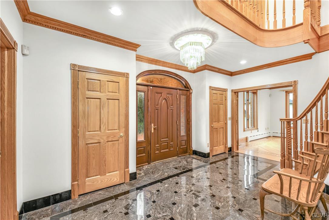 3166 Apollo Drive Bethlehem, PA 18017 - Photo 4 of 37 a view of a hallway with wooden floor and entryway