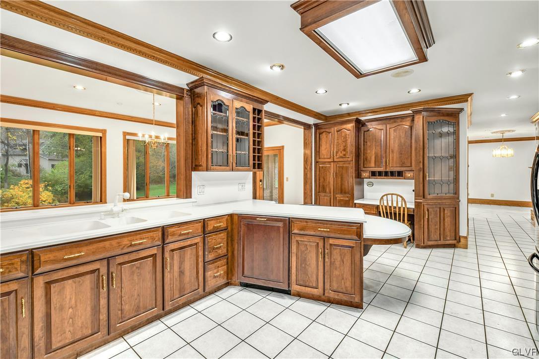 3166 Apollo Drive Bethlehem, PA 18017 - Photo 9 of 37 a large kitchen with stainless steel appliances granite countertop a sink and cabinets
